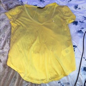 Think yellow V-neck shirt